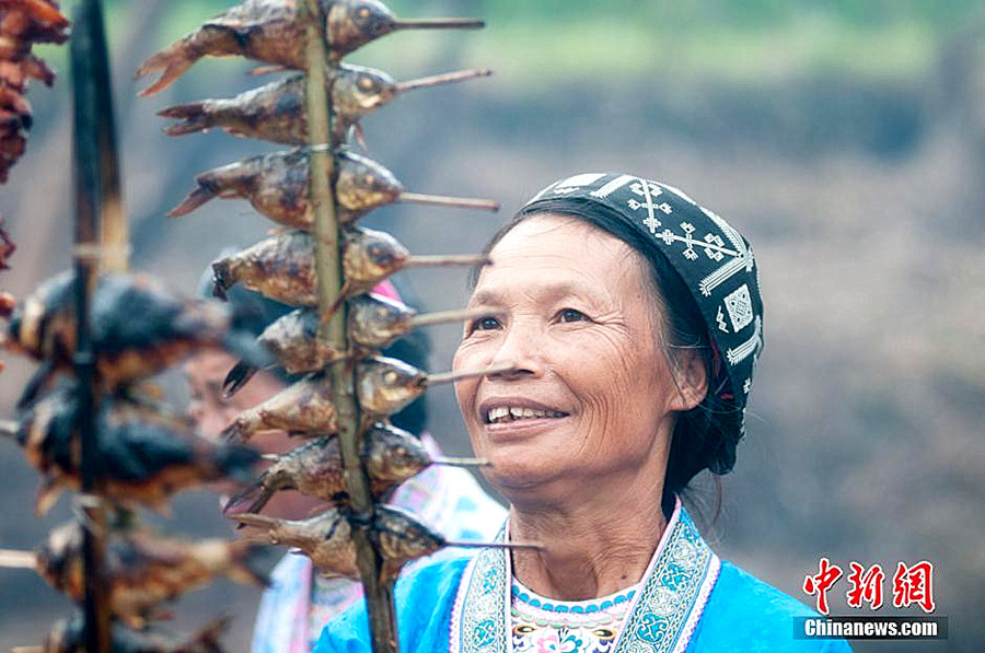 Miao people celebrate traditional 'grilling fish' festival
