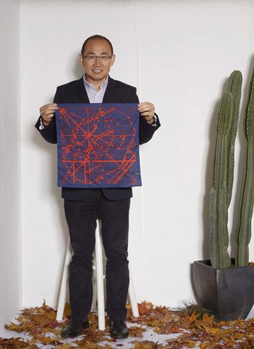 Artistic handkerchiefs raise money to plant trees in Inner Mongolia