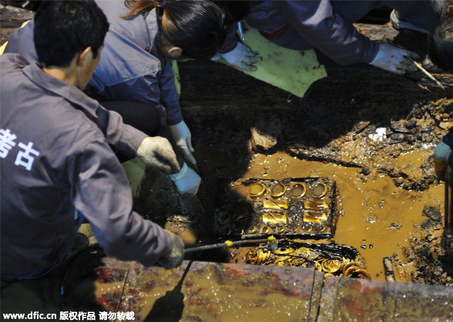 Gold coins, hoofs found in 2,000-year-old Chinese tomb