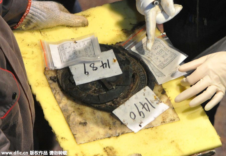 187 large gold coins found in 2,000-year-old tomb in Jiangxi