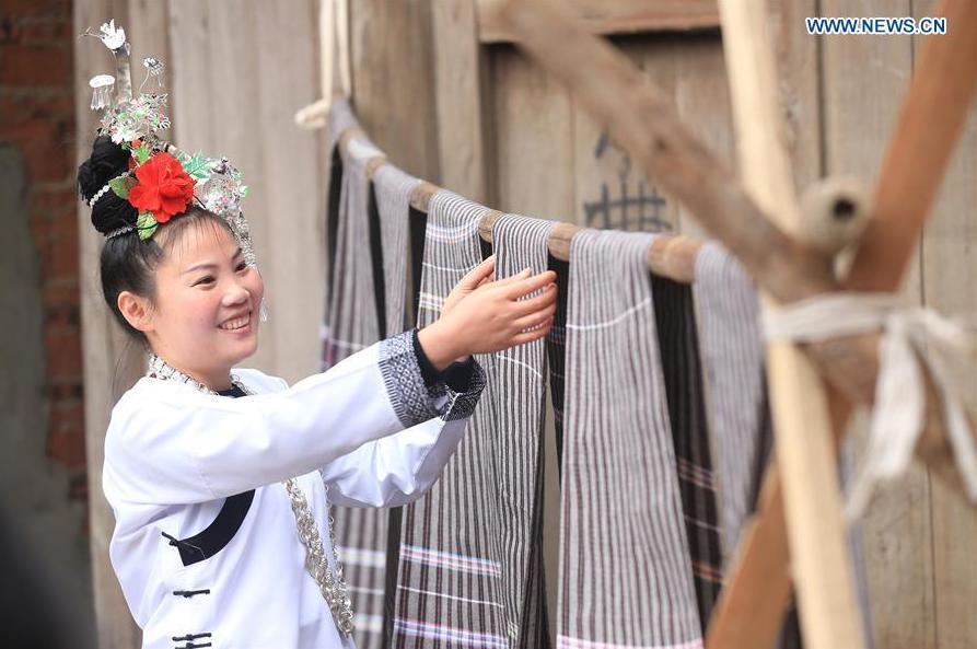 Traditional costumes making of Dong ethnic group