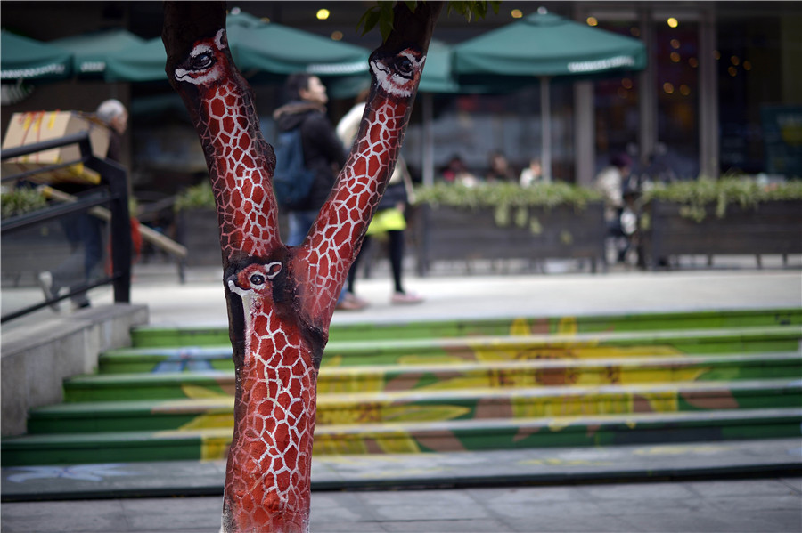 Vivid tree graffiti decorates downtown Chongqing