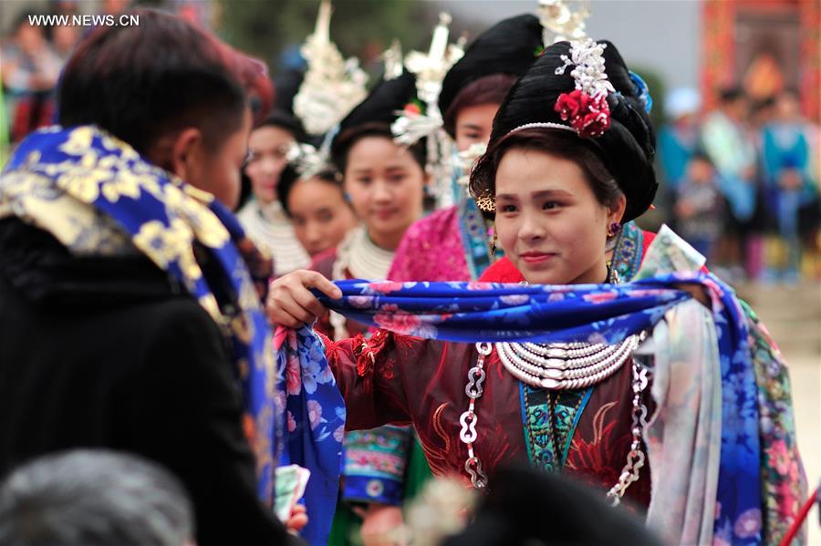 Miao women dress up to celebrate Spring Festival