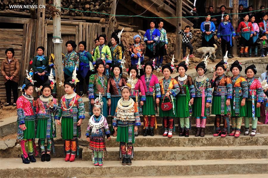Miao women dress up to celebrate Spring Festival