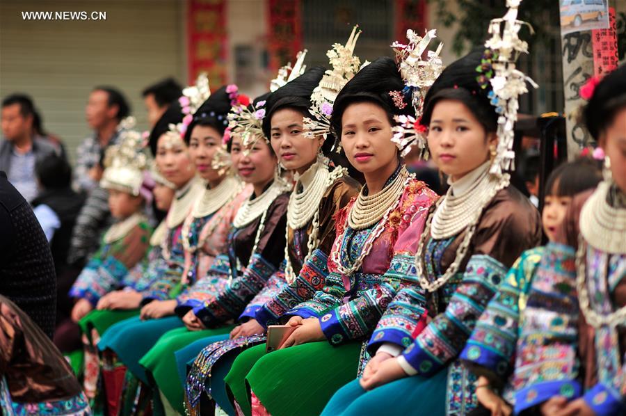 Miao women dress up to celebrate Spring Festival