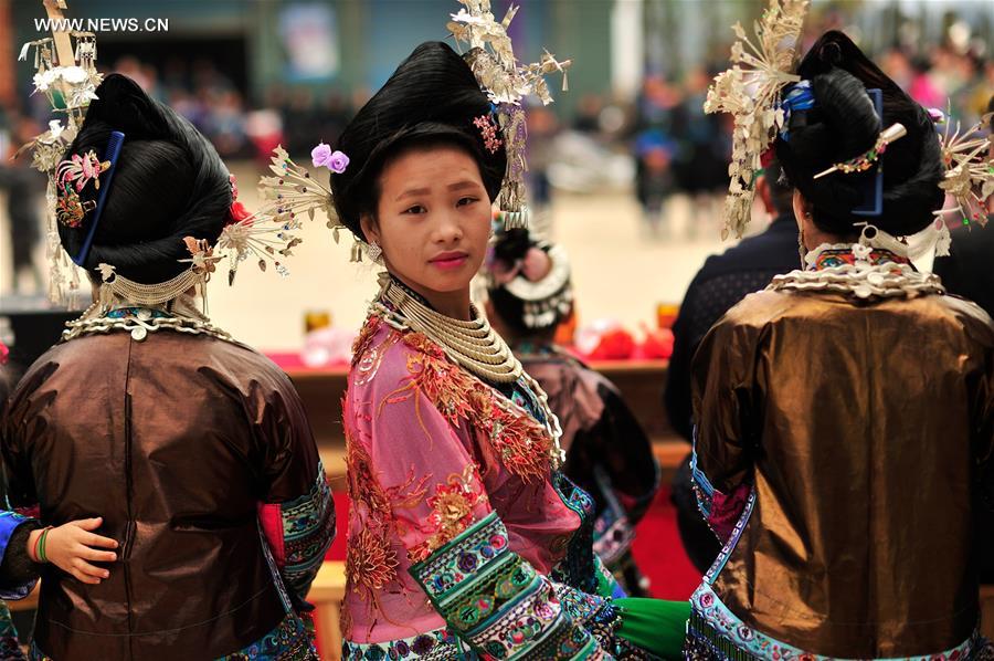 Miao women dress up to celebrate Spring Festival