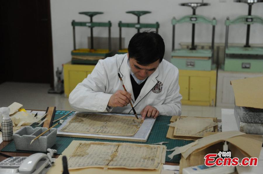 Great efforts needed to restore ancient books