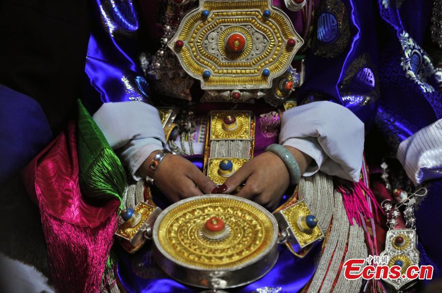 Young couple holds traditional Tibetan wedding ceremony