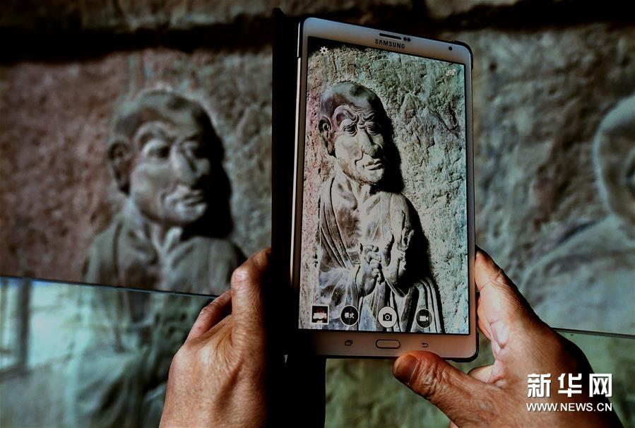 Longmen Grottoes opens new Buddhist cave