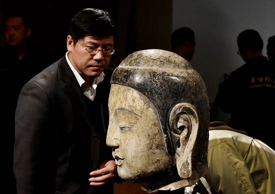 Stolen Buddha statue head arrives in Hebei museum