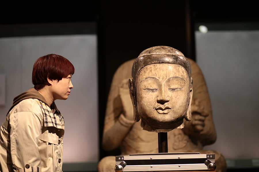 Stolen Buddha statue head arrives in Hebei museum