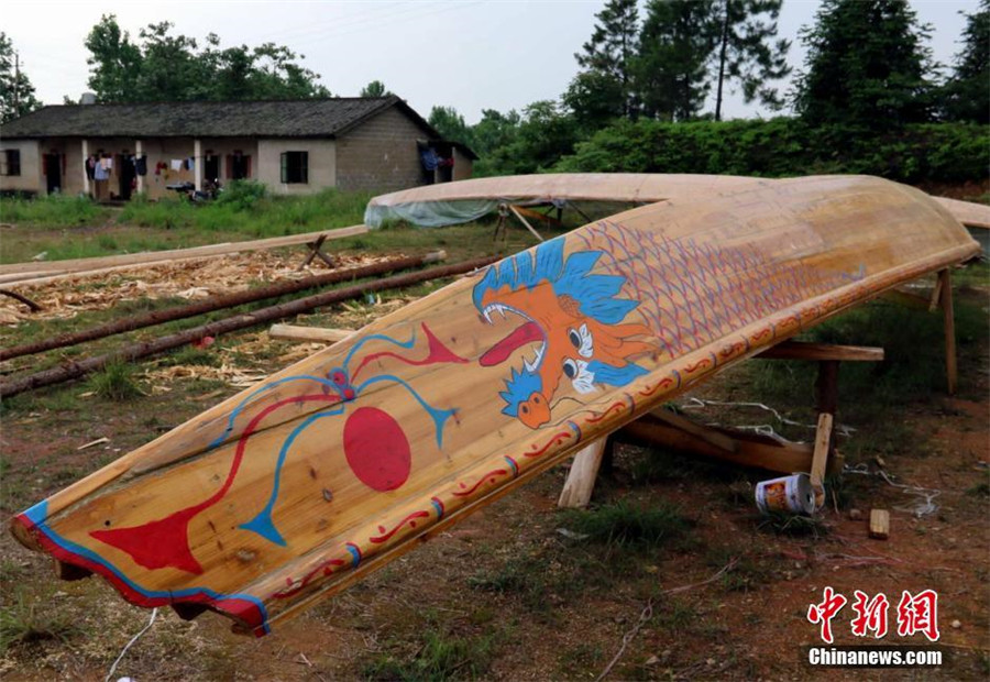 Craftsman busy making boats for Dragon Boat Festival