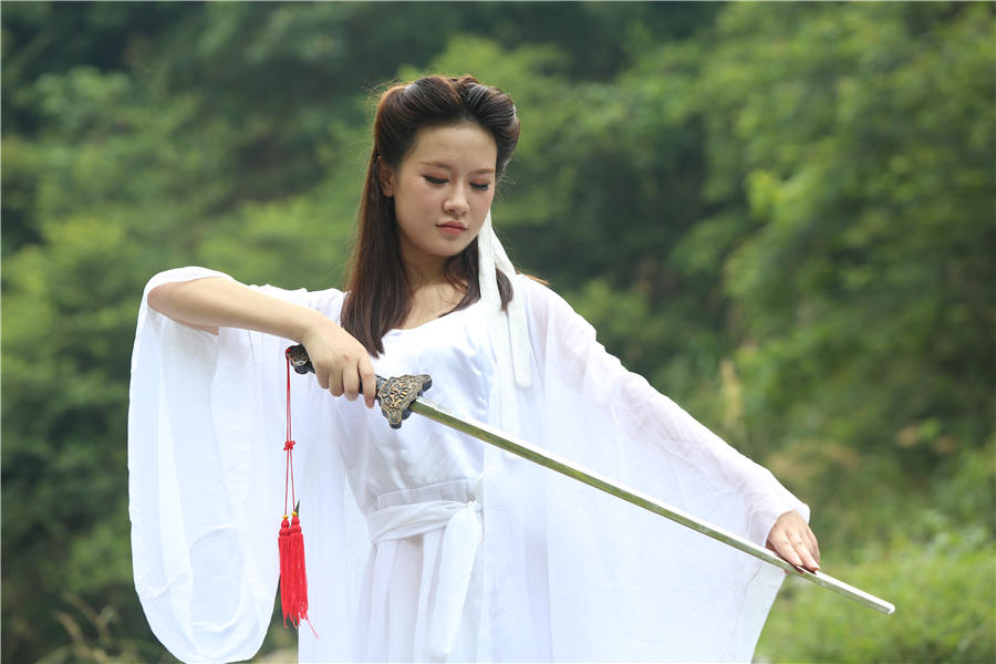 Girl power: Females wave swords, practice kung fu at scenic spot