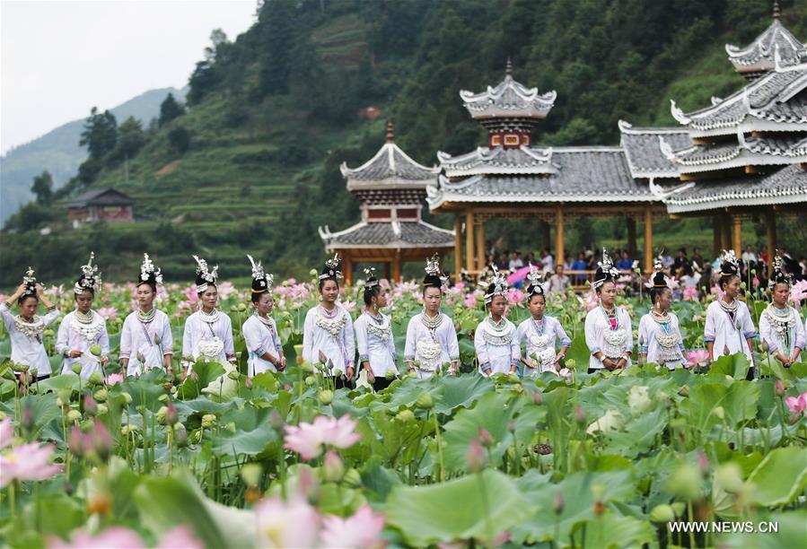 People of Dong ethnic group perform to promote local tourism