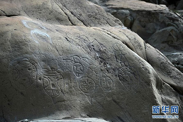 NW China cliff paintings severely damaged by floods