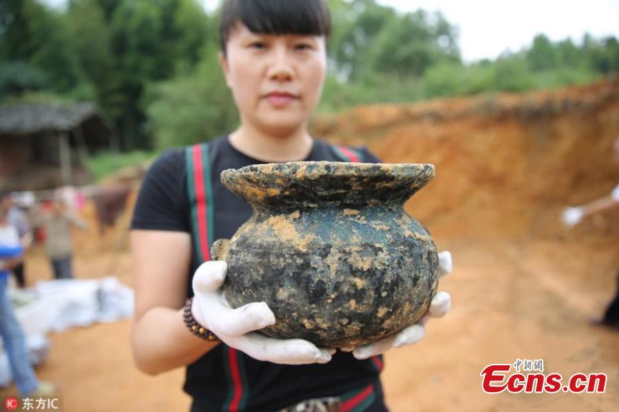 Villager digs out ancient artifacts in E China county