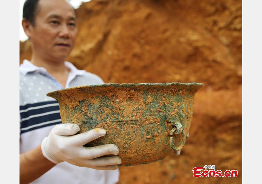Villager digs out ancient artifacts in E China county