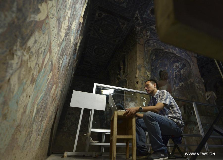Films based on murals in cave of Mogao Grottoes completed
