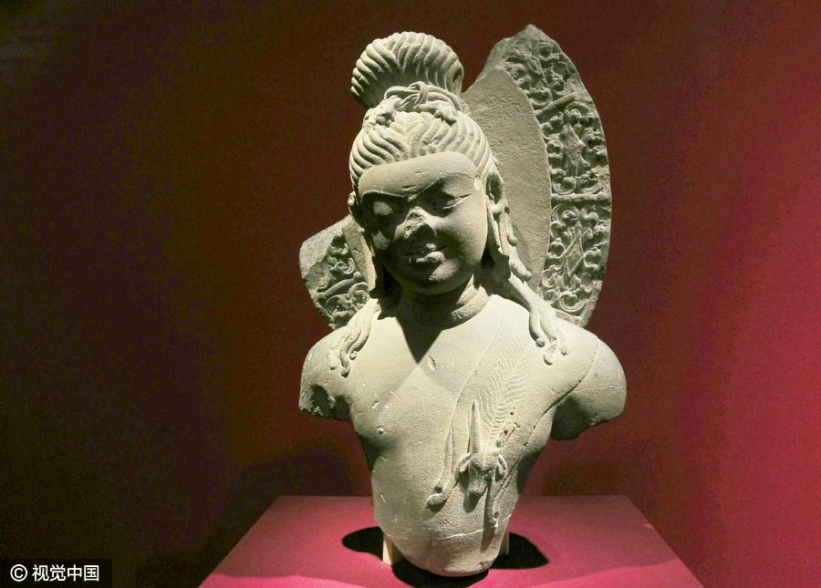Chinese and Indian sculptures on display at the Palace Museum in Beijing