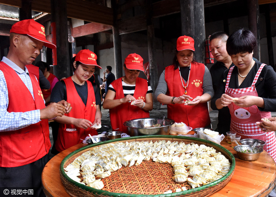 Flowers, cakes and dance mark Double Ninth Festival