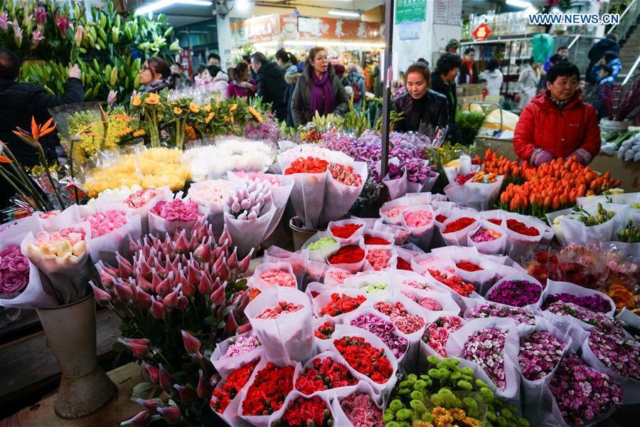 Customers shop at flower market in Beijing