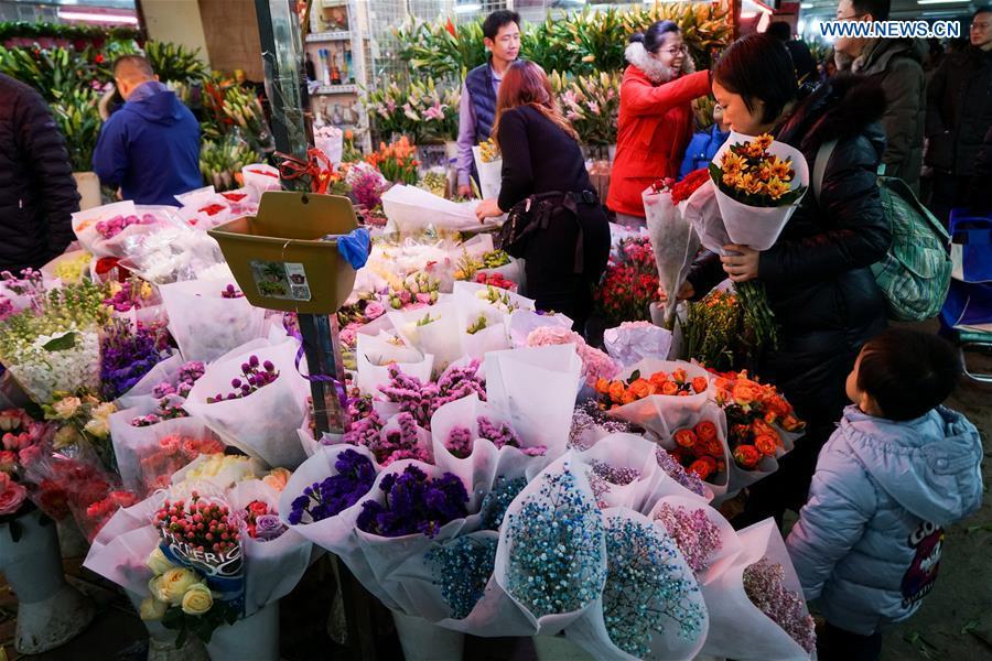 Customers shop at flower market in Beijing
