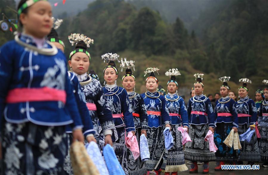 People of Miao ethnic group take part in folk events welcoming spring