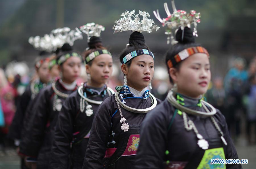 People of Miao ethnic group take part in folk events welcoming spring