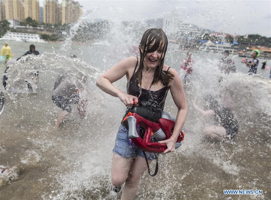 Water-sprinkling festival marked in SW China