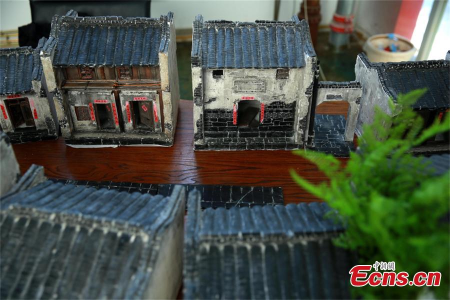 Nostalgic man makes building miniatures