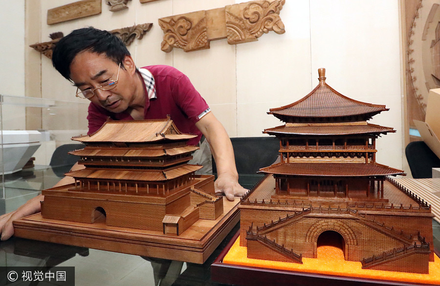 Xi'an folk artist creates miniature ancient complexes