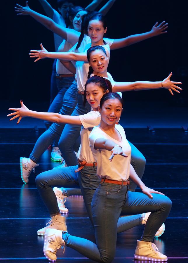 Local residents take part in dance competition in Shanghai