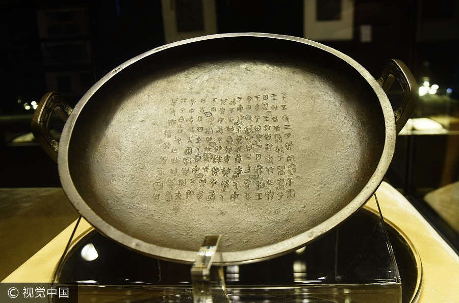 Ancient bronze plate breaks auction record