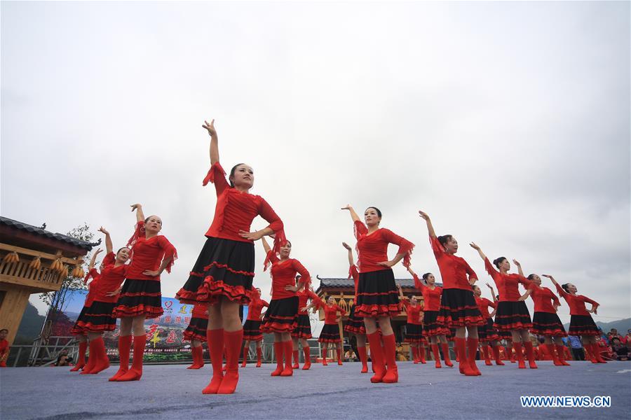 People take part in square dance competition in C China's Hunan