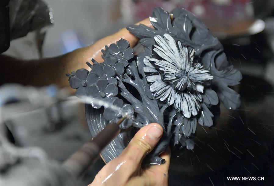 Unique sculpture of chrysanthemum stone in C China's Hubei