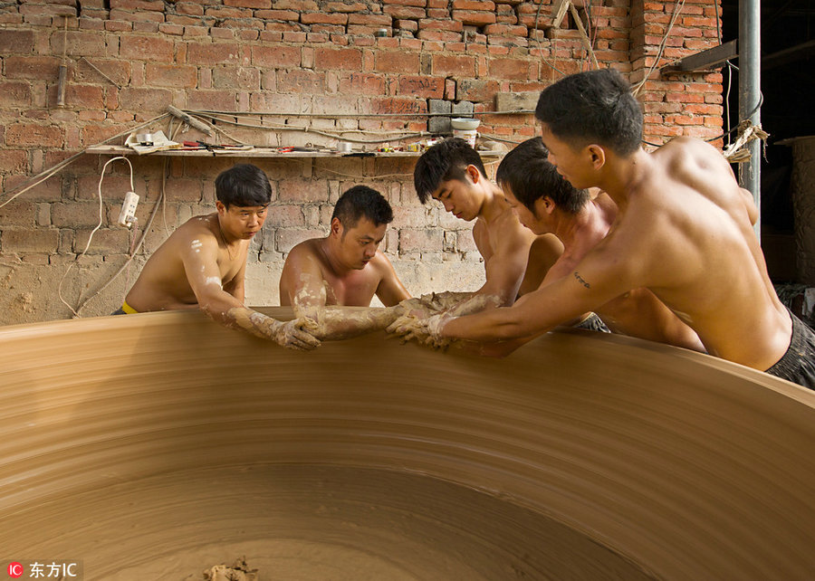 Sweat and clay: Process of making Jingdezhen's porcelain
