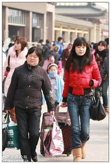 春运：网友镜头记录西安火车站“回家的表情”