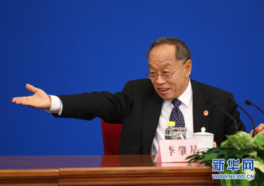 李肇星：中国各方面总体上已实现有法可依