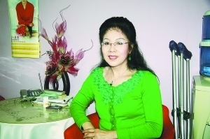记残疾人红丝带志愿者董淑芬