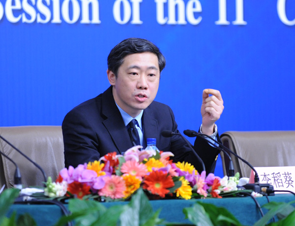 李稻葵答记者问