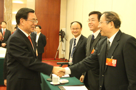 中共中央政治局常委、中央纪委书记贺国强看望人大福建代表团（组图）