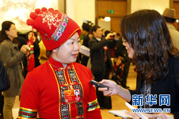 大会堂里的基层代表：一定把乡亲们的话“捎”到会上