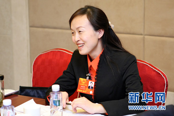 胡春霞:政府的决心和措施让农民工充满信心