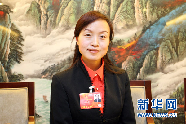 胡春霞:政府的决心和措施让农民工充满信心