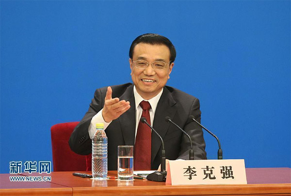 李克强：中国和平发展与维护主权两条原则并行不悖