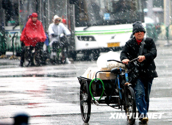 上海迎来今冬最明显降雪 日最低气温将跌破“冰点”