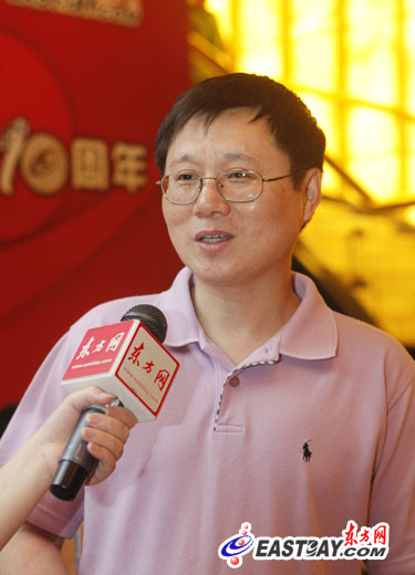 周黎明：传统媒体、新媒体齐步走