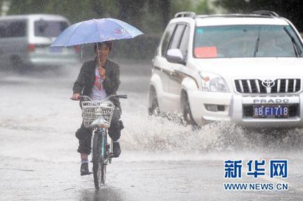 东北仍有暴雨来袭 江南大部炎热不减