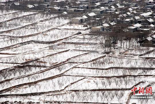 中国大部分地区普遍降温 迎来降雪天气