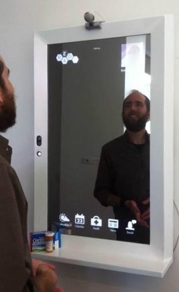 美研发“魔镜” 可阅读新闻又可试穿新衣